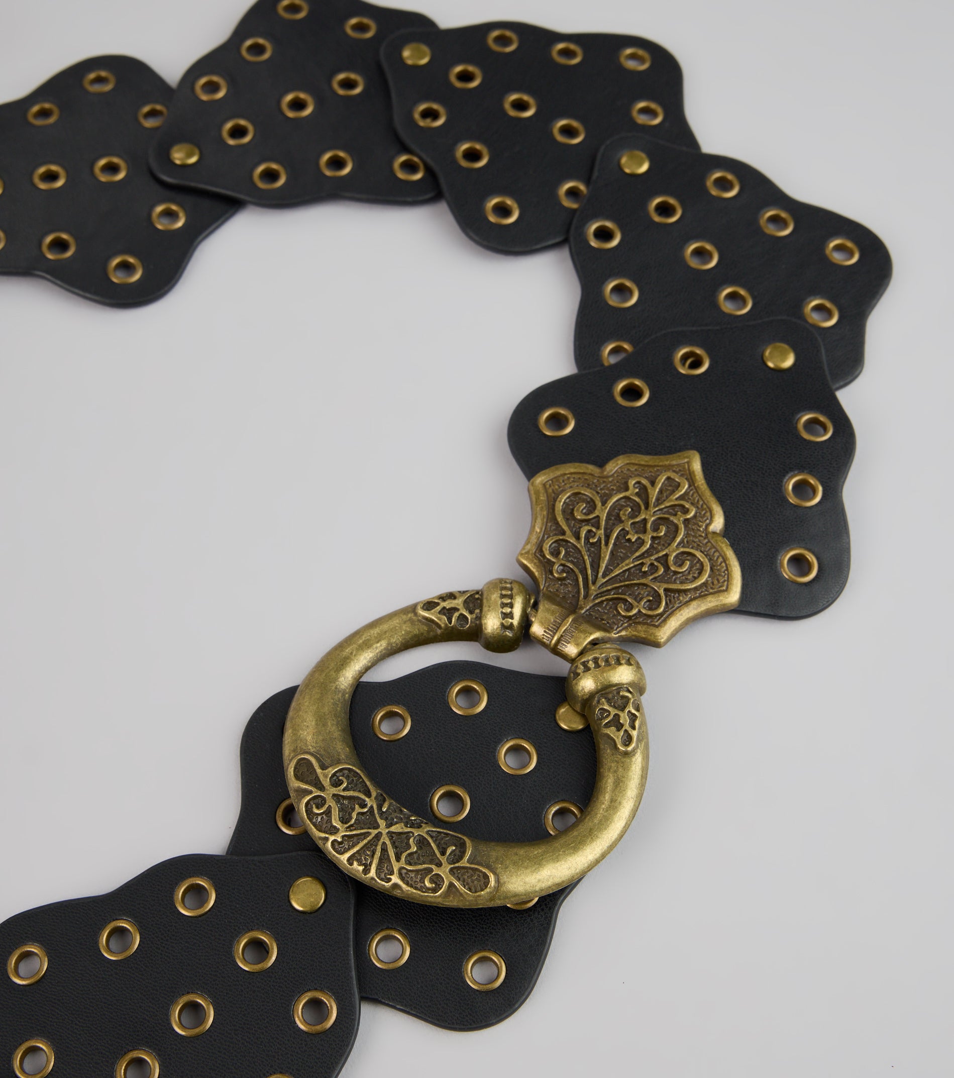 Golden Edge Grommet Medallion Belt