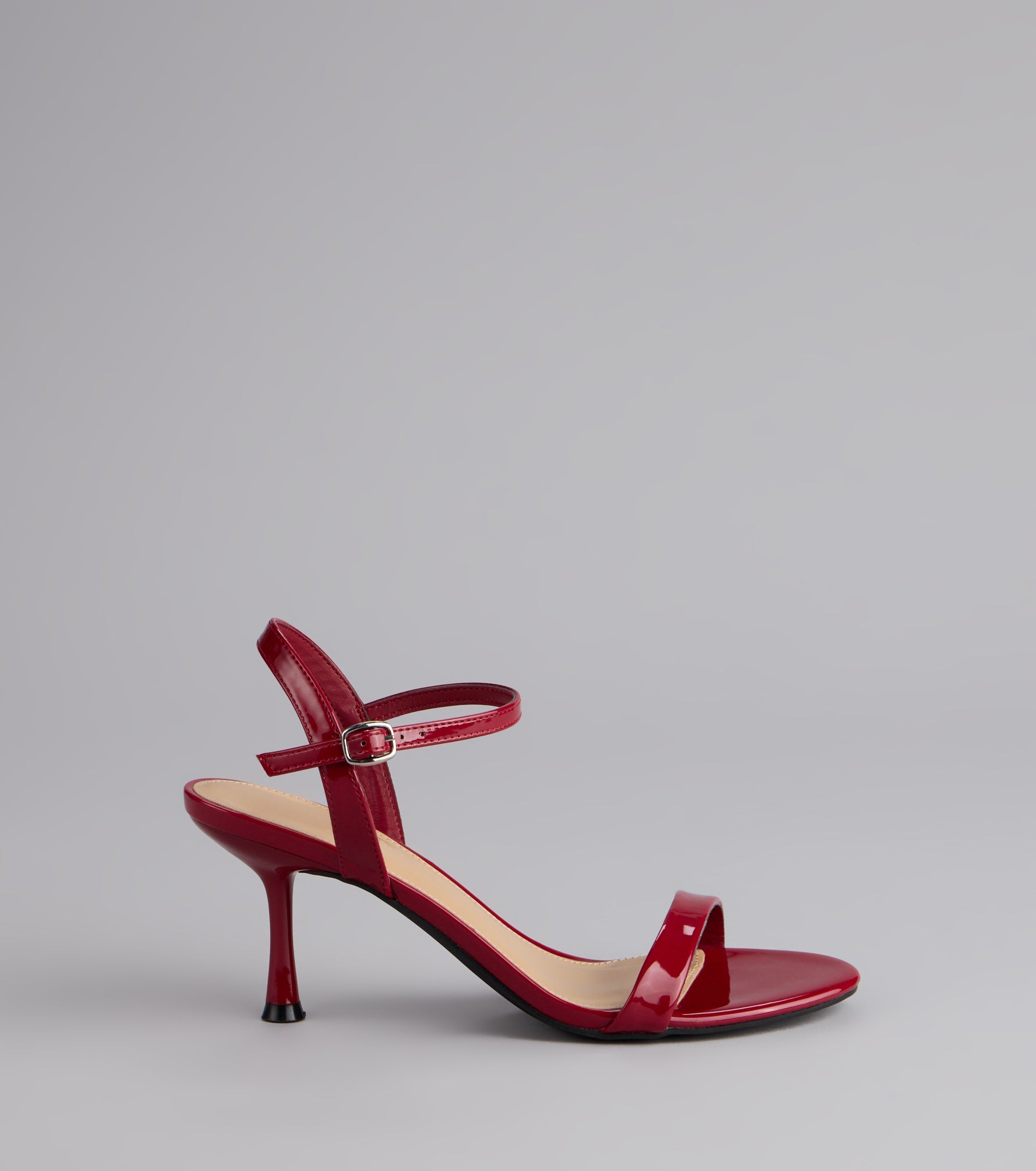 Sleek And Simple Patent Kitten Heels