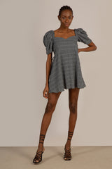 Black and white textured off shoulder mini dress