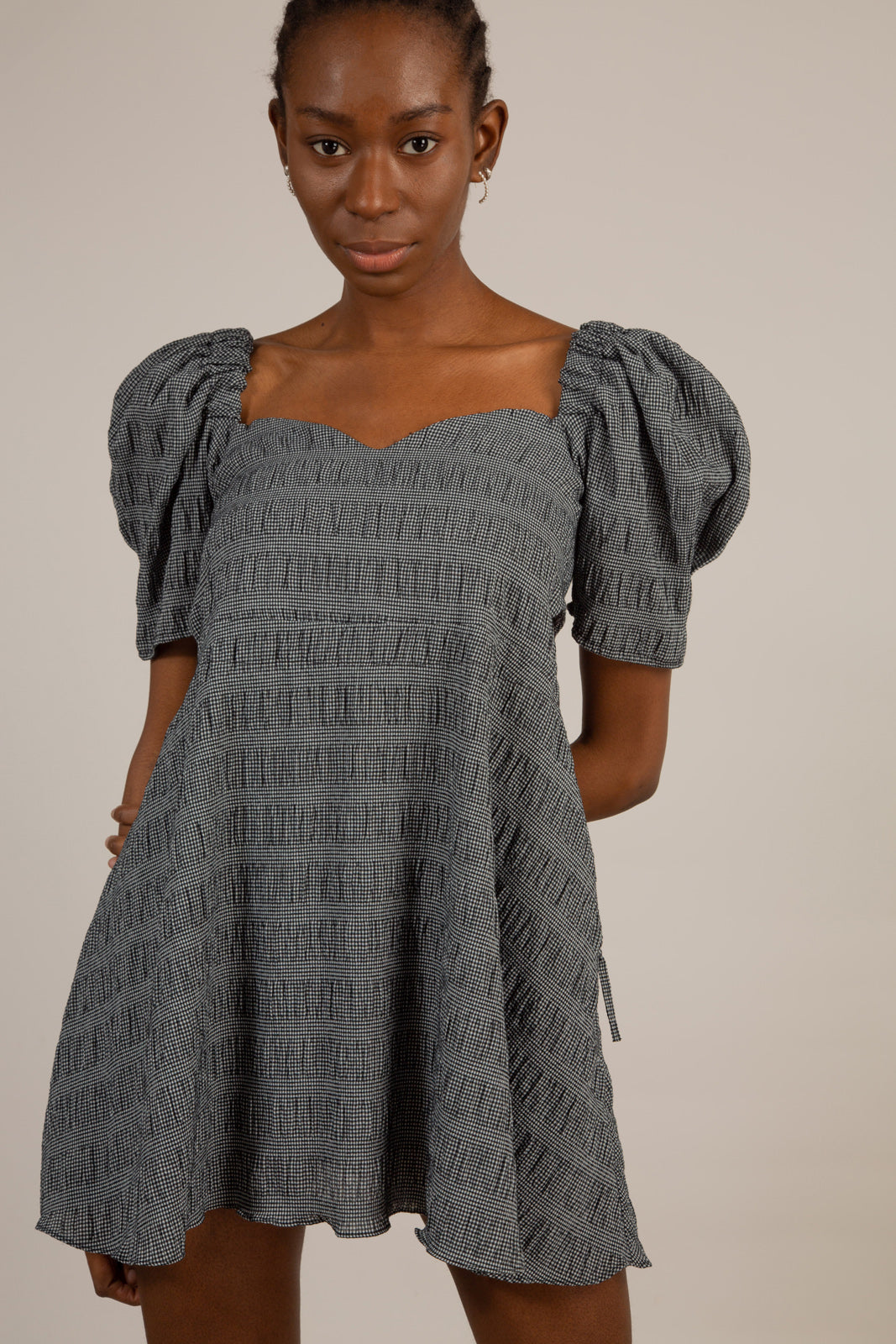 Black and white textured off shoulder mini dress