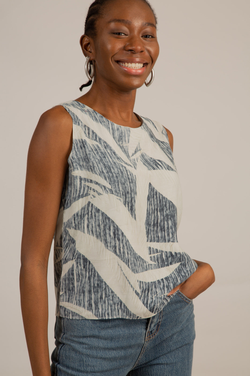 Ivory and black leaves print sleeveless top
