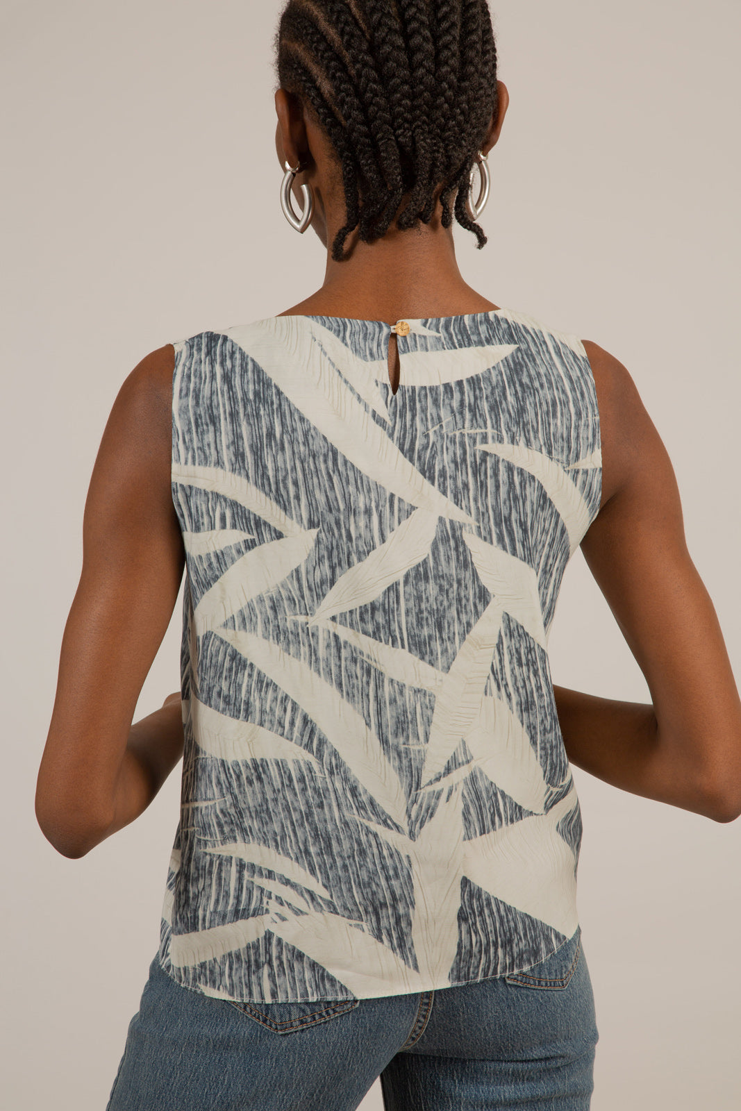 Ivory and black leaves print sleeveless top