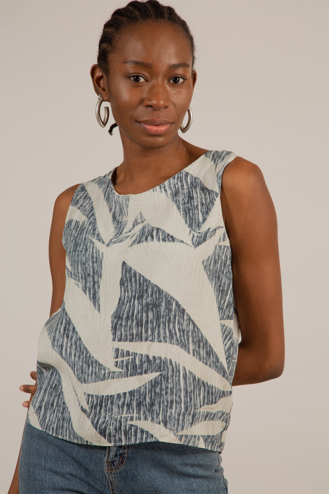 Ivory and black leaves print sleeveless top
