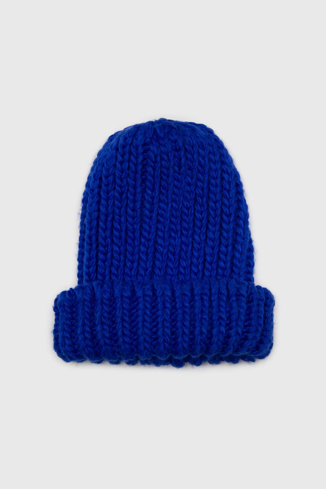 Cobalt blue ribbed black feather pom pom hat