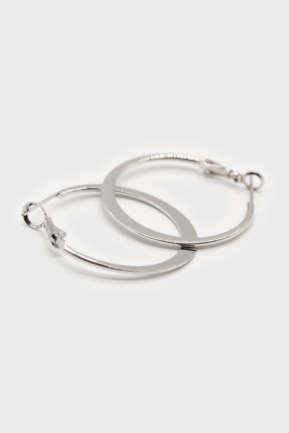 Silver medium smooth flat hoop earrings