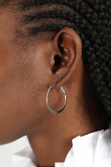 Silver medium smooth flat hoop earrings