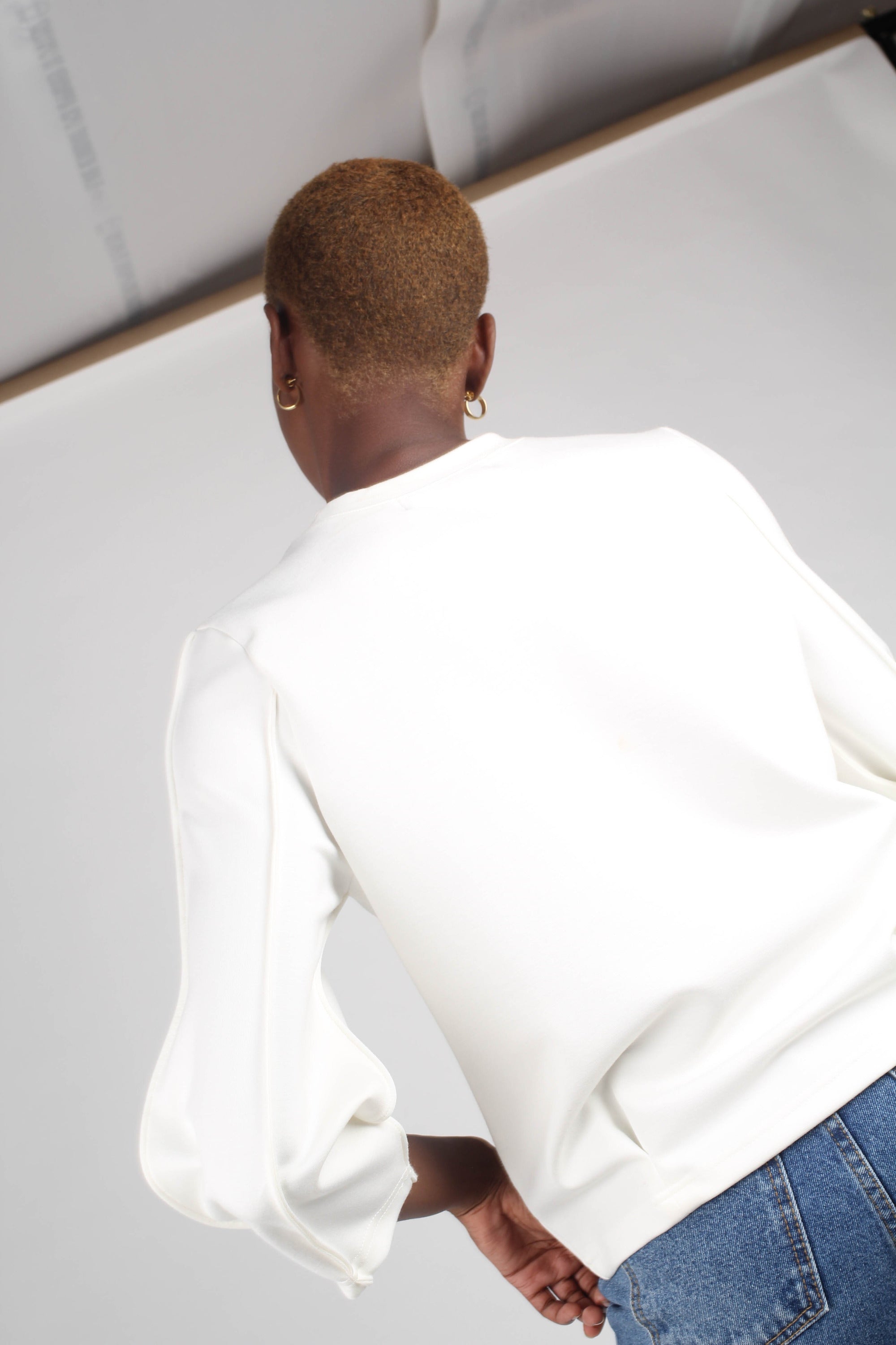 White sharp seamed sleeve top