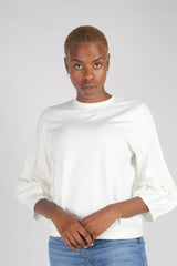 White sharp seamed sleeve top