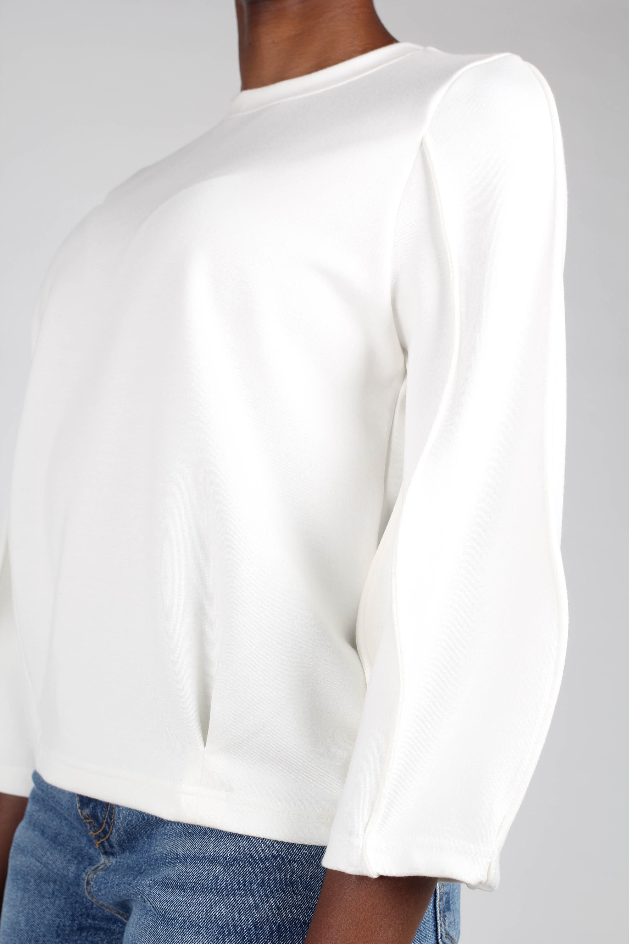 White sharp seamed sleeve top