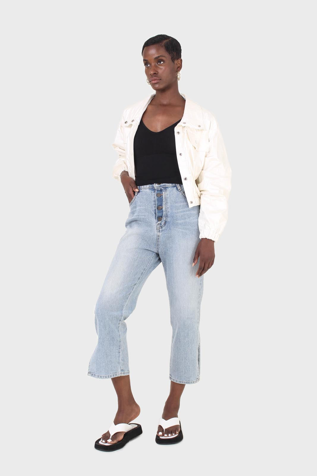 Light blue wash exposed button jeans