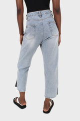 Light blue wash exposed button jeans