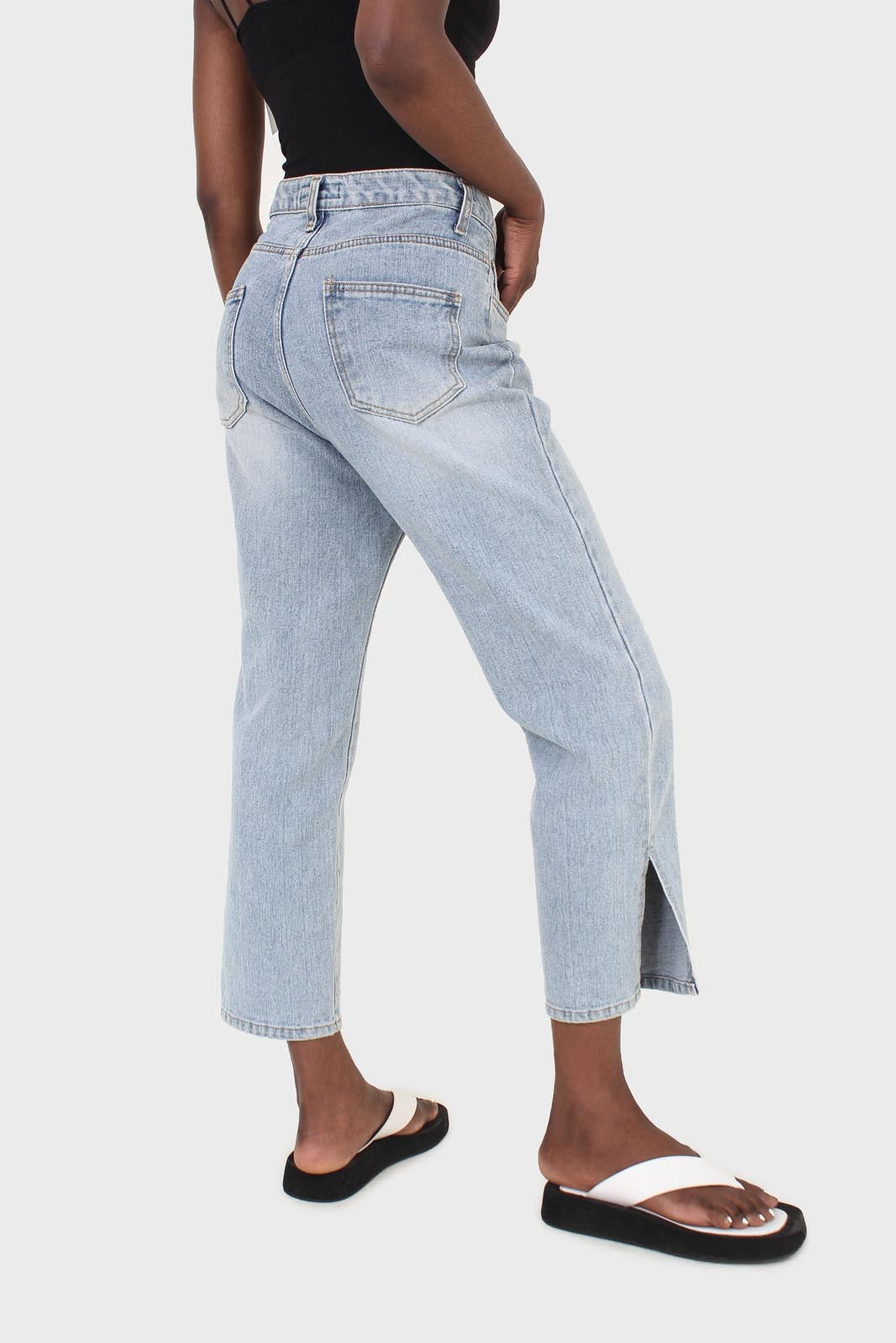 Light blue wash exposed button jeans