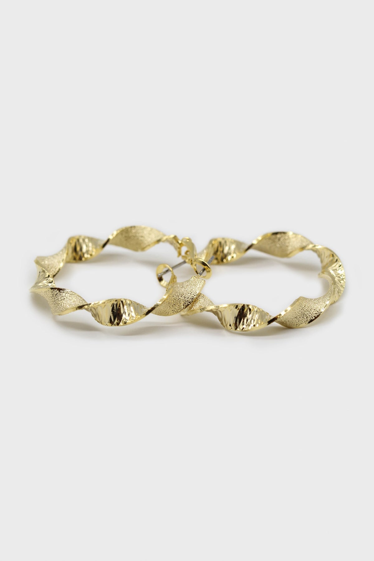Gold rough smooth twisted hoop earrings