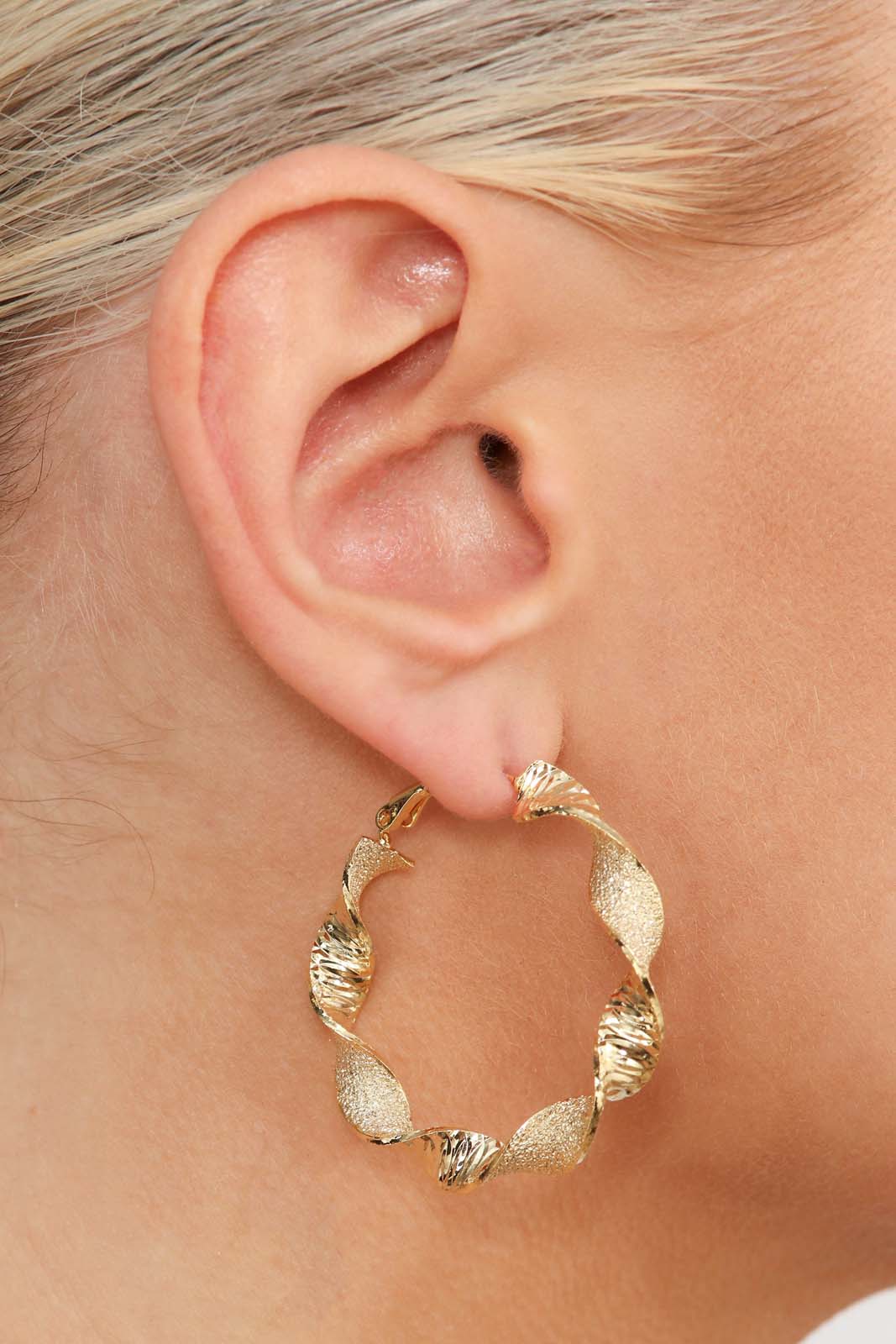 Gold rough smooth twisted hoop earrings