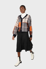 Black lined midi length flare knit skirt