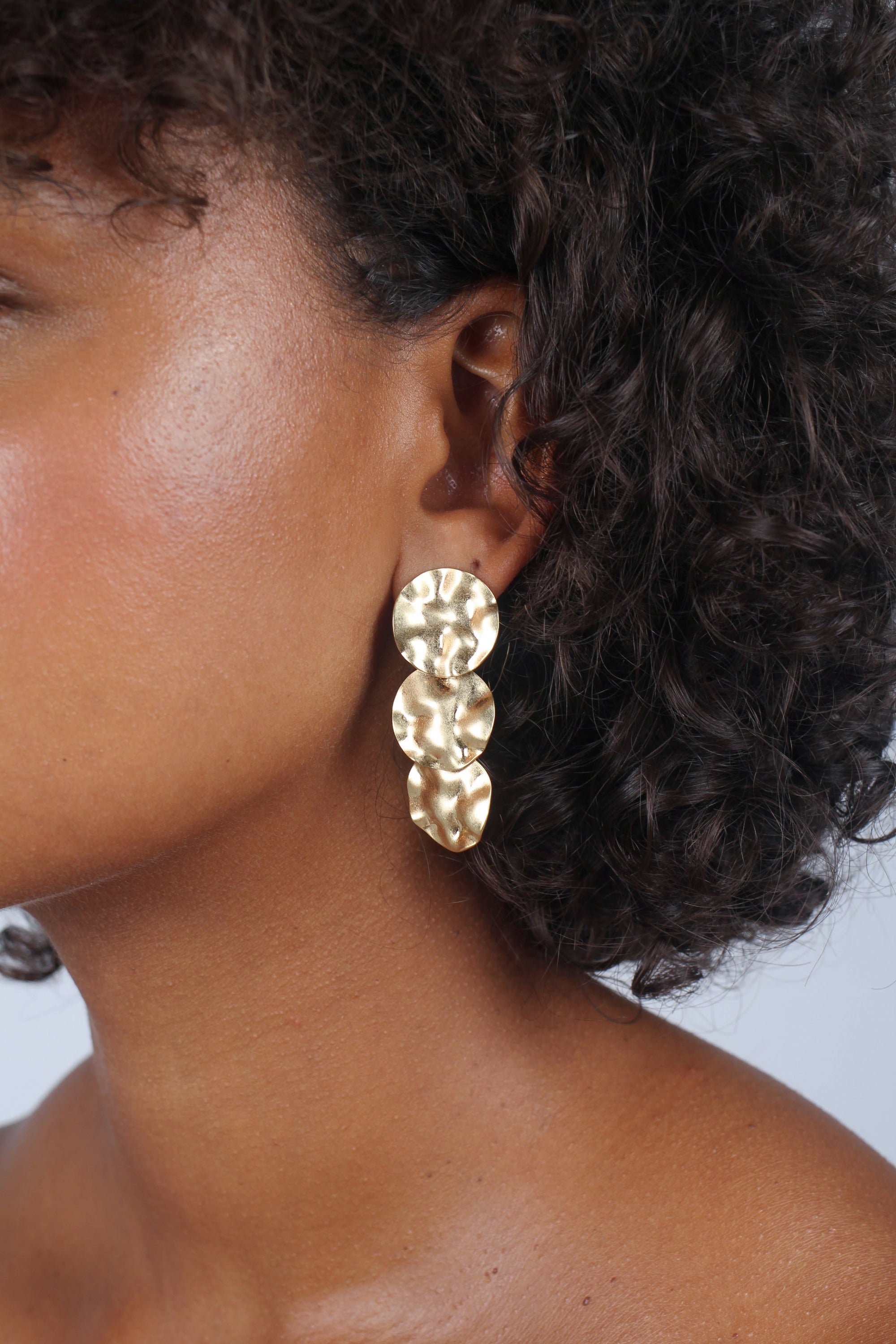 Gold hammered three circle earrings