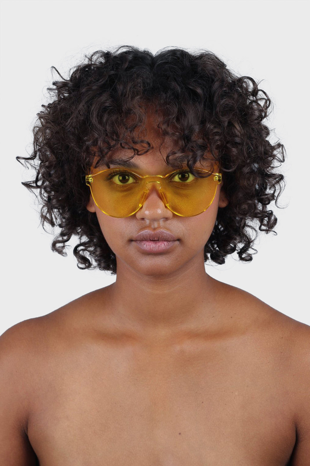 Yellow frameless round sunglasses