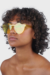 Yellow frameless round sunglasses