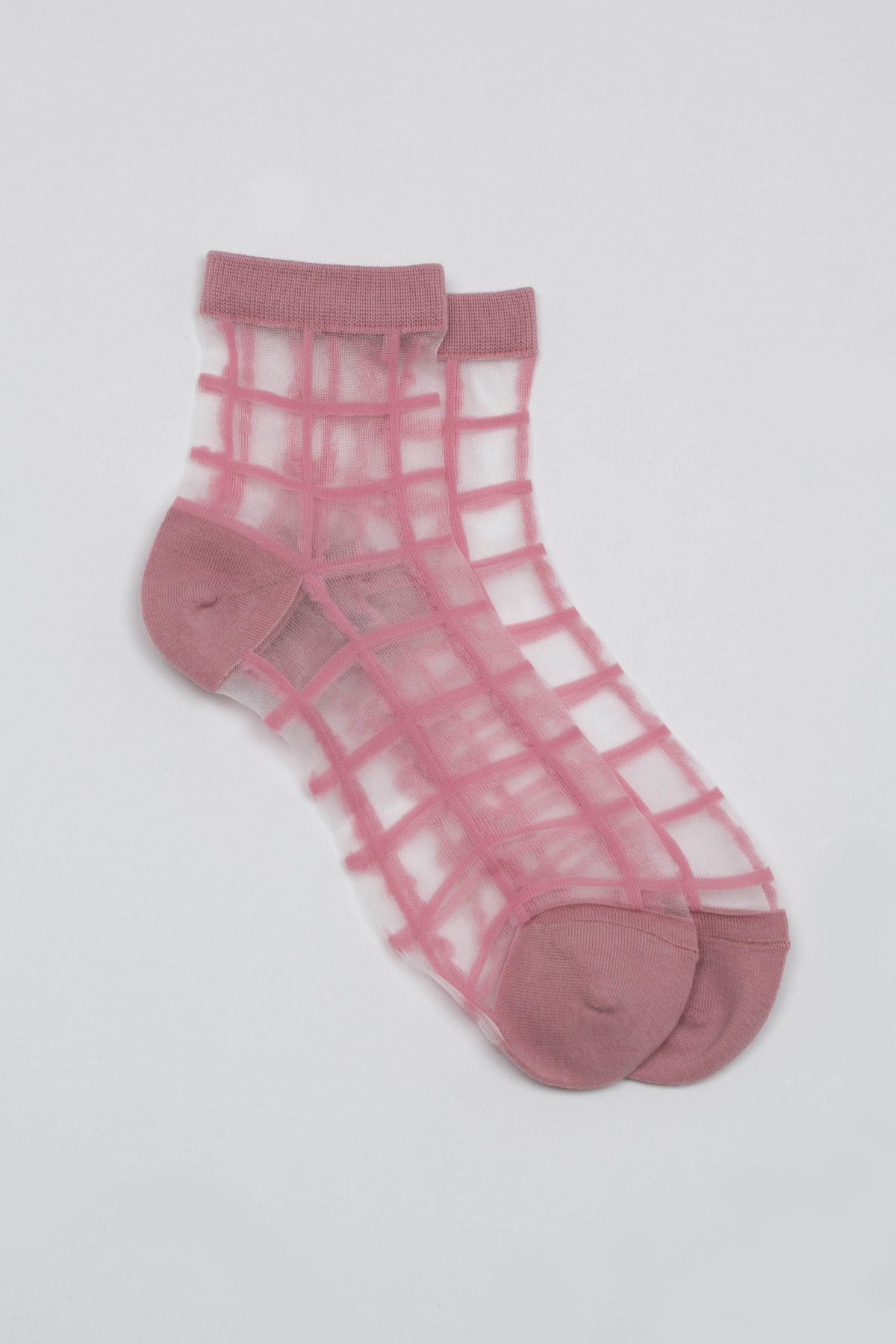 Pale pink sheer grid socks