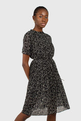 Black and white floral micro pleated belted dress