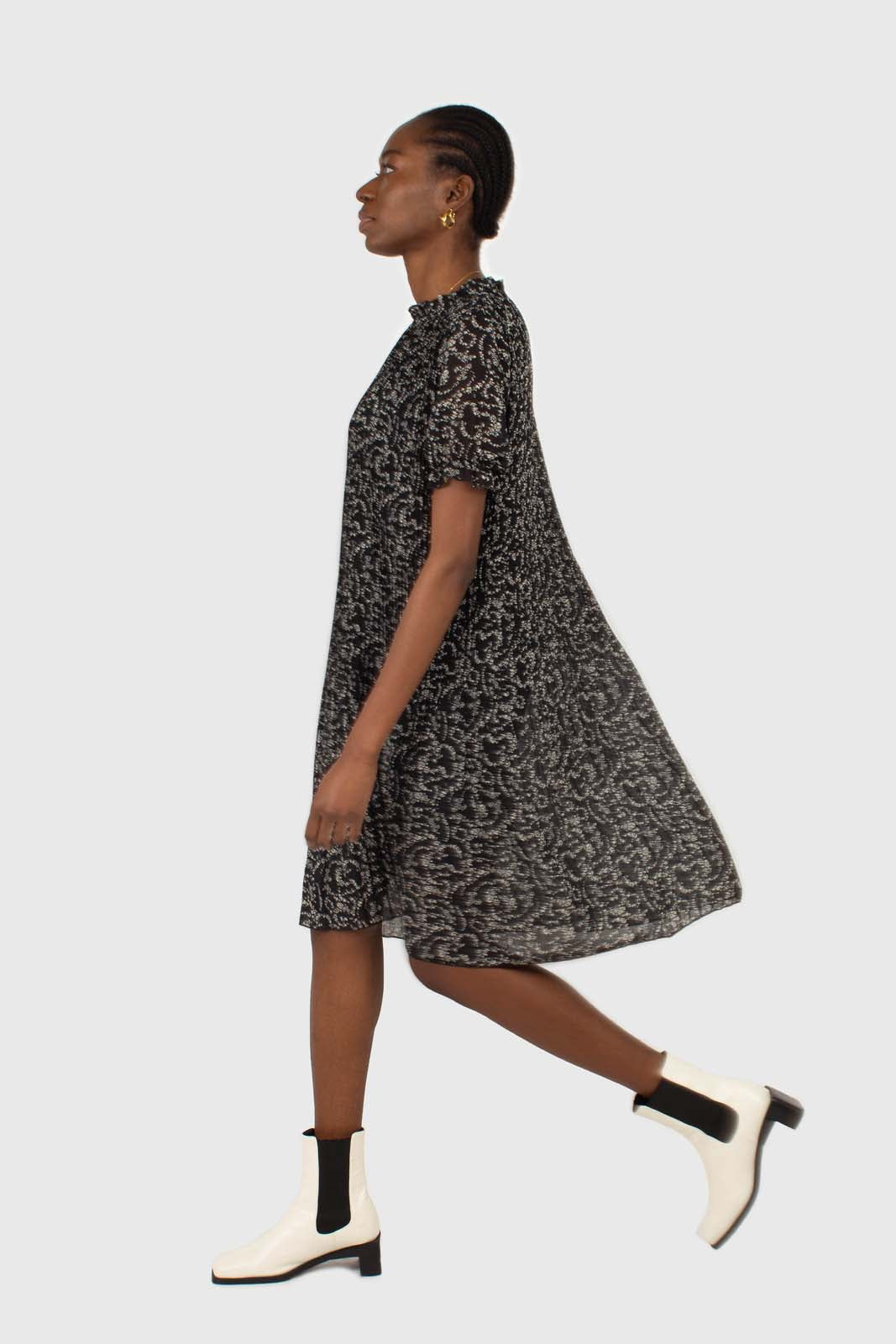 Black and white floral micro pleated belted dress