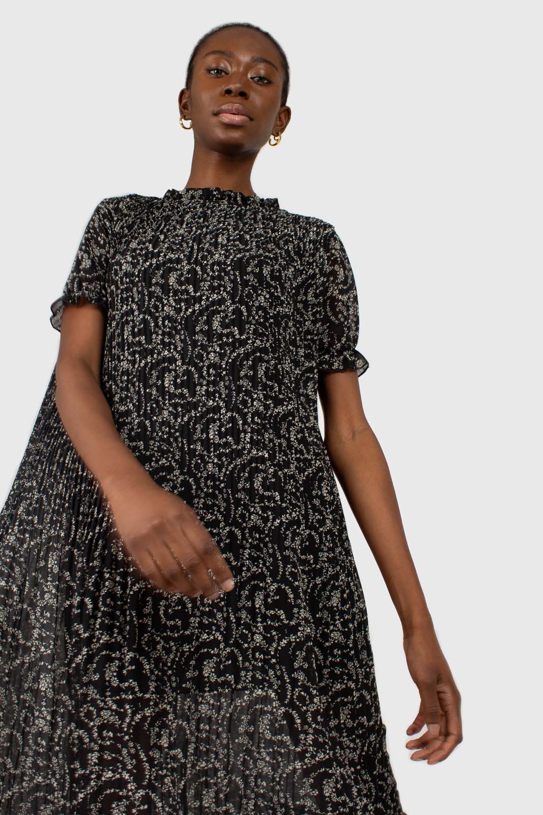Black and white floral micro pleated belted dress