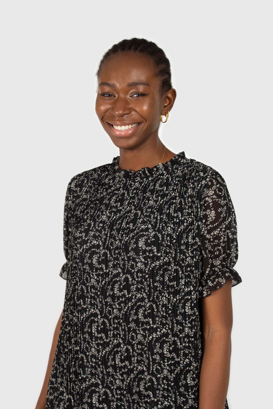 Black and white floral micro pleated belted dress