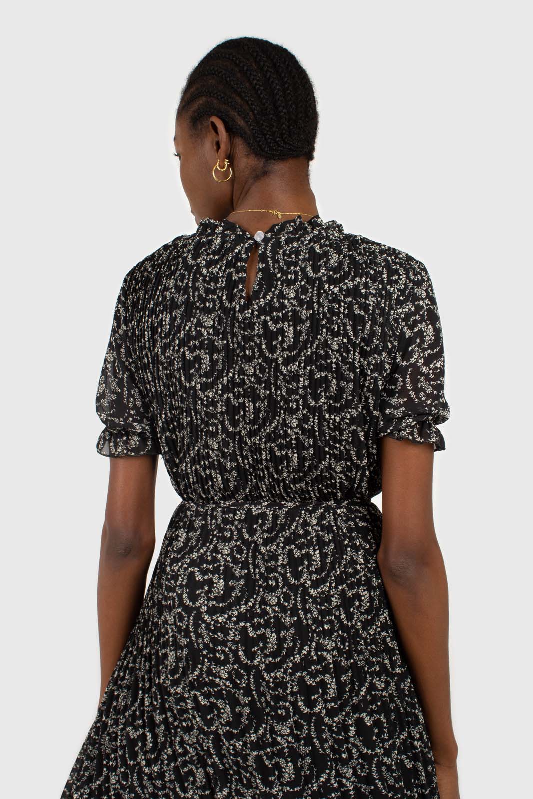 Black and white floral micro pleated belted dress