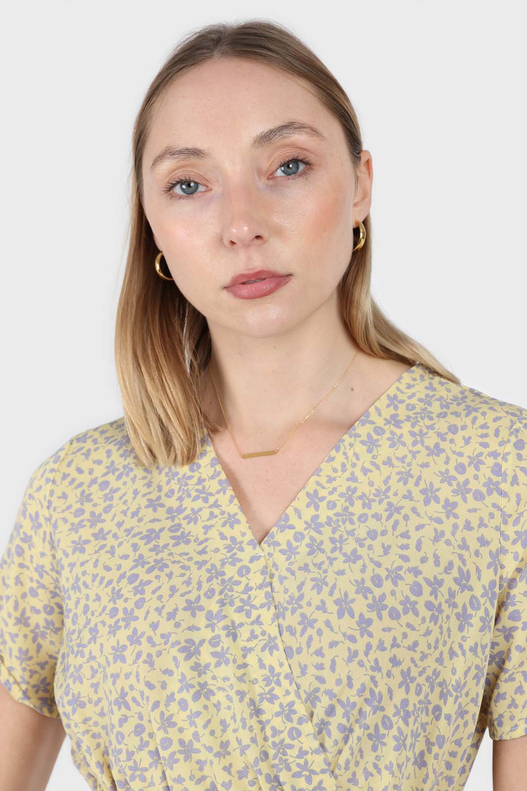Pale yellow and grey floral V-neck mini dress