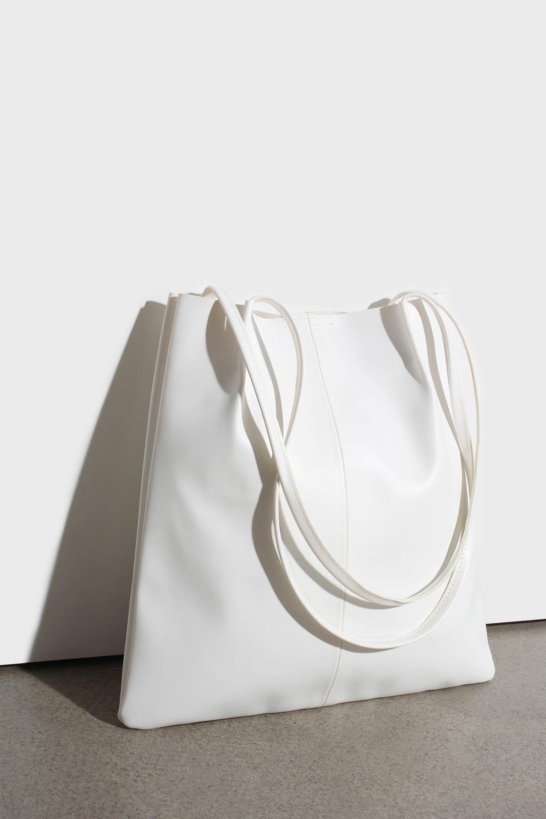 Ivory vegan leather pinched strap tote bag