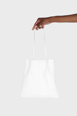 Ivory vegan leather pinched strap tote bag