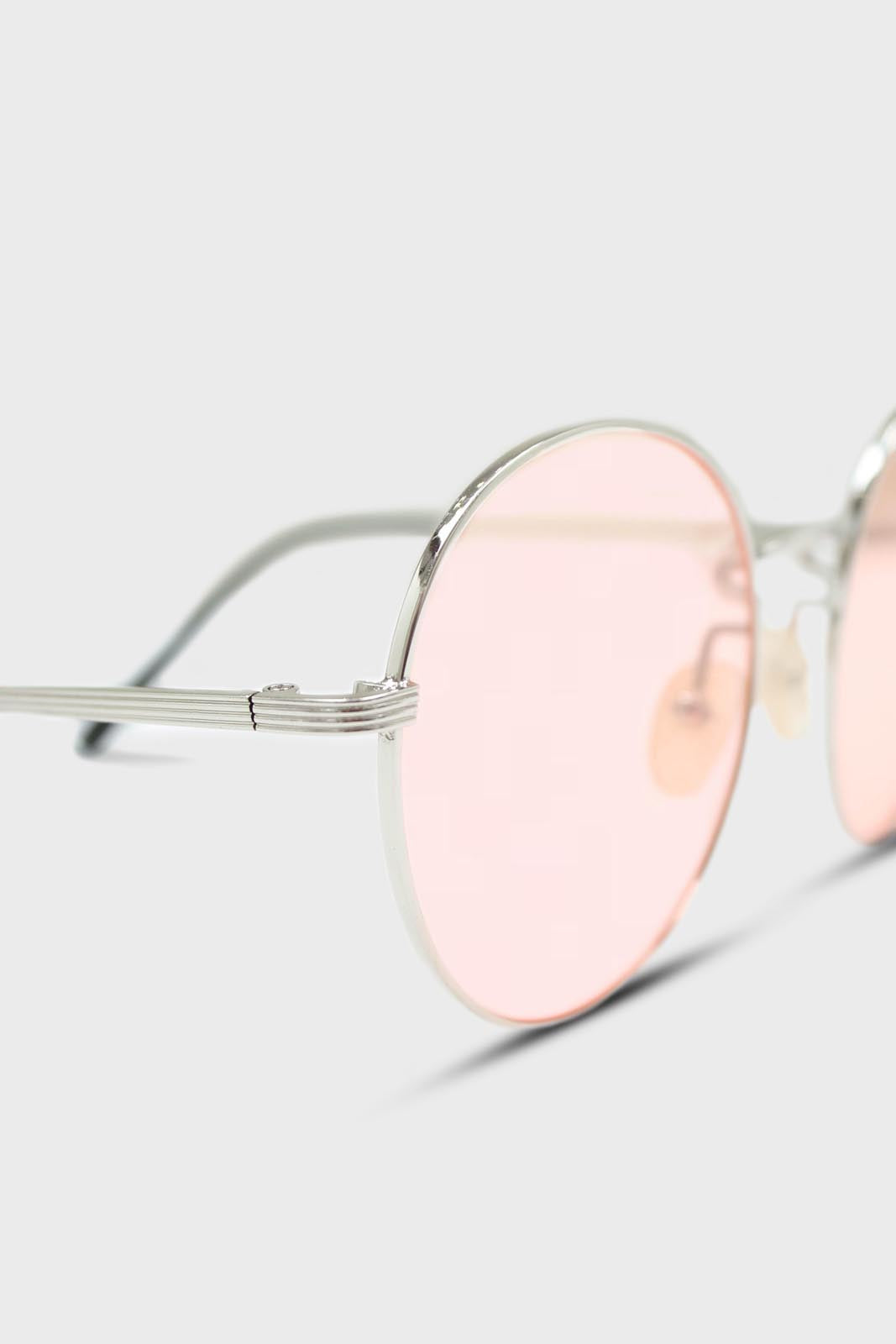 Pale pink and gold lined round sunglasses