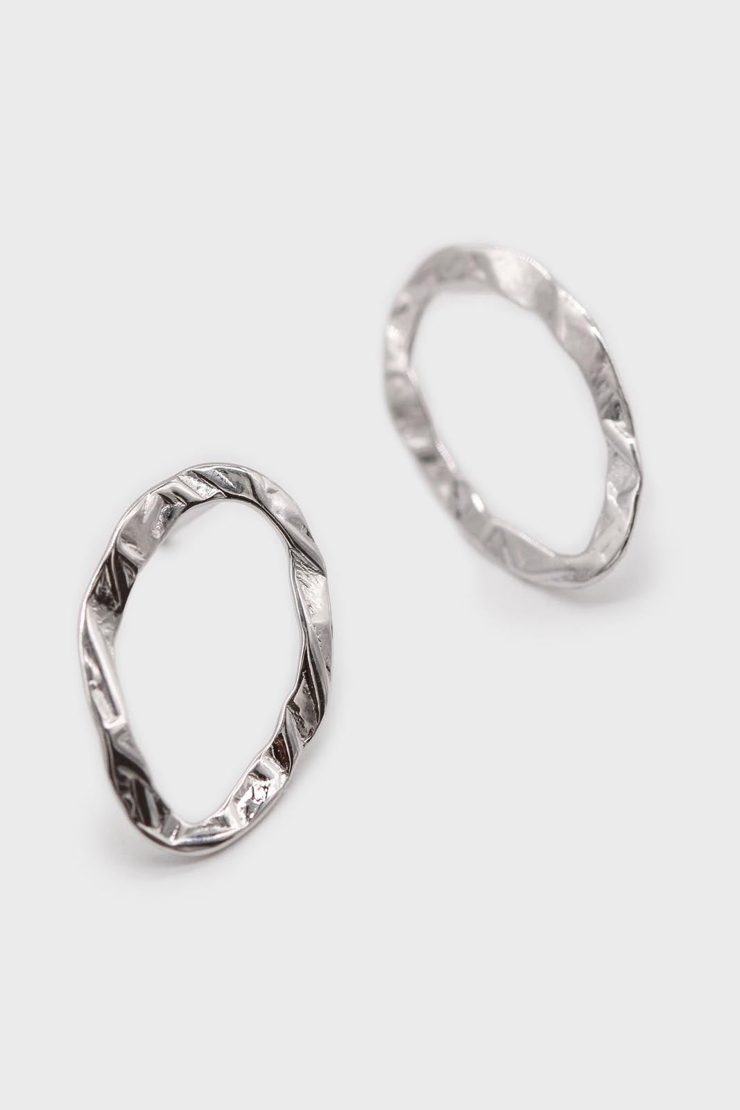 Silver flat hammered oval earrings