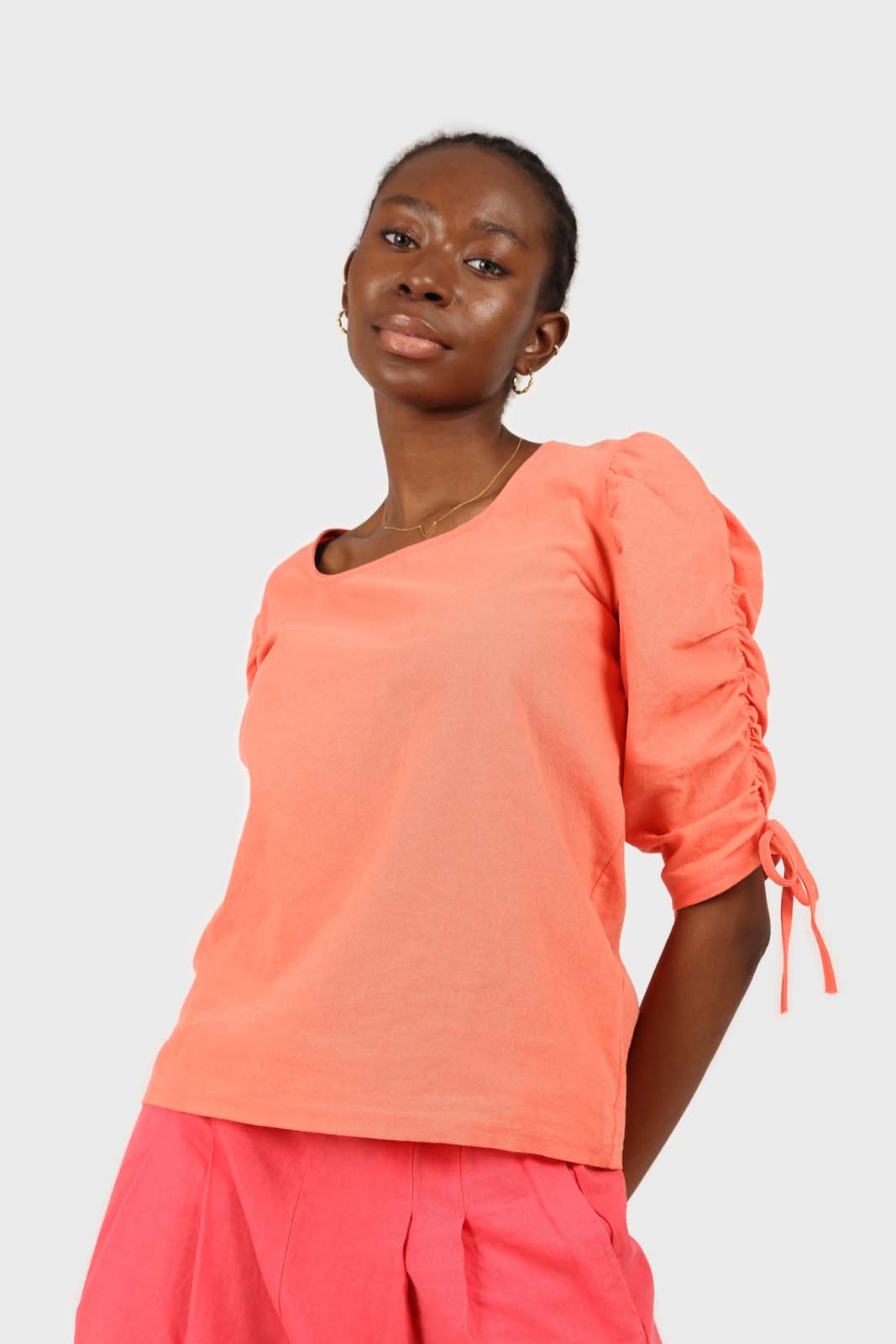 Orange pull string sleeve linen top