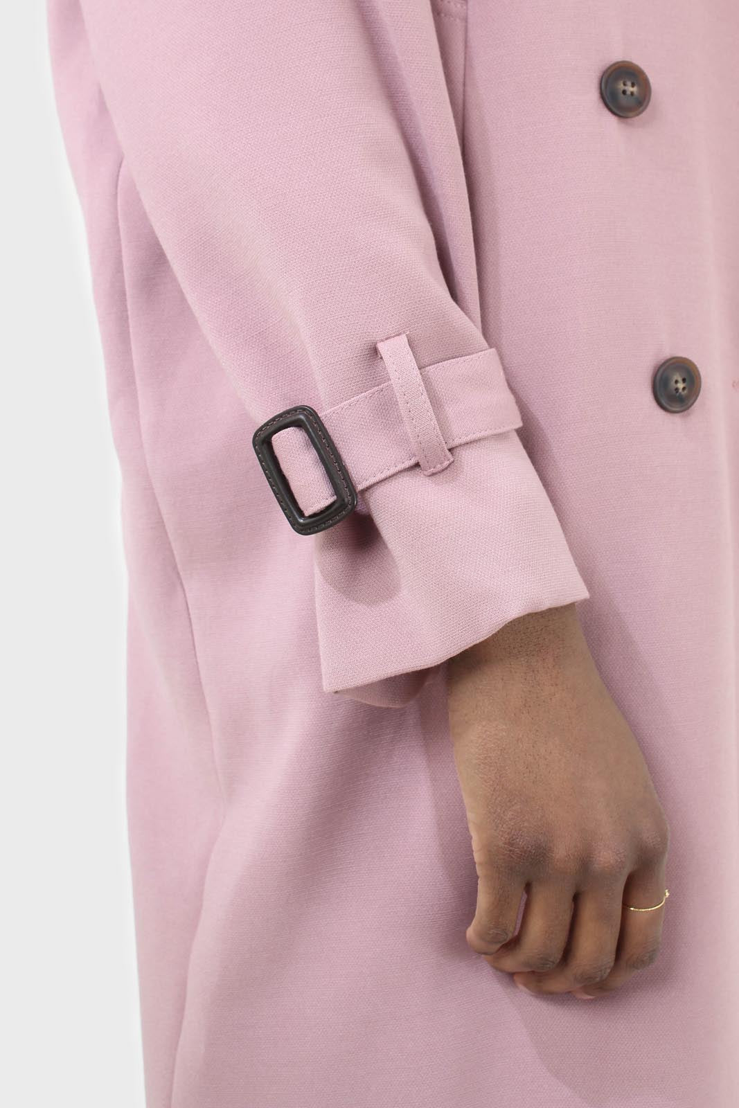 Pale pink double breasted belted trench coat