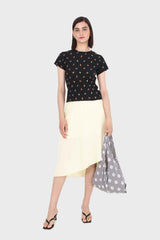 Pale yellow asymmetric hem midi skirt
