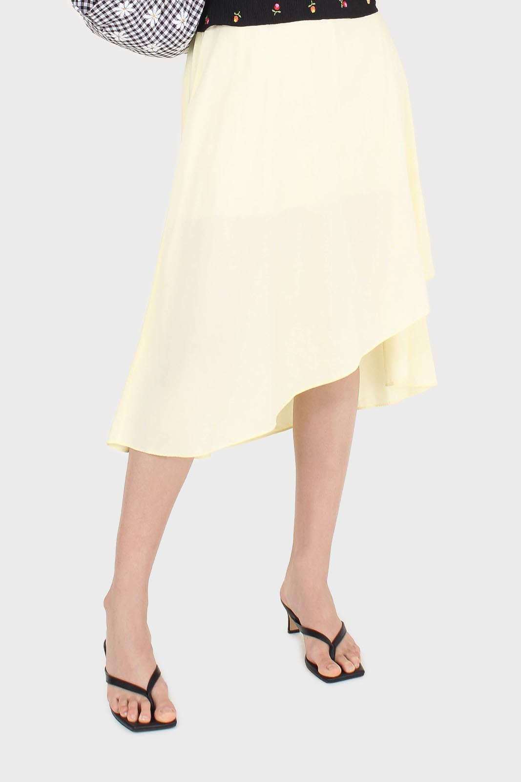 Pale yellow asymmetric hem midi skirt