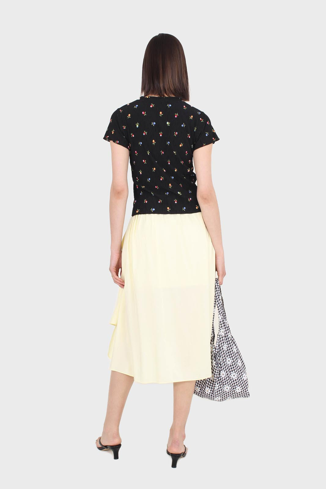 Pale yellow asymmetric hem midi skirt