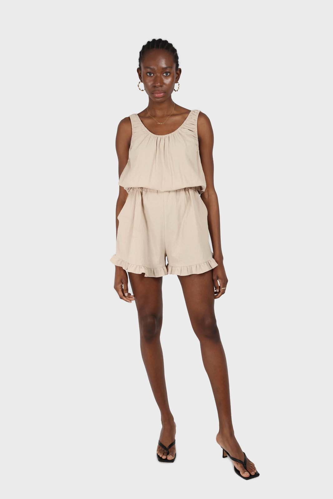 Beige ruffle hem sleeveless romper