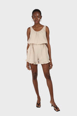 Beige ruffle hem sleeveless romper