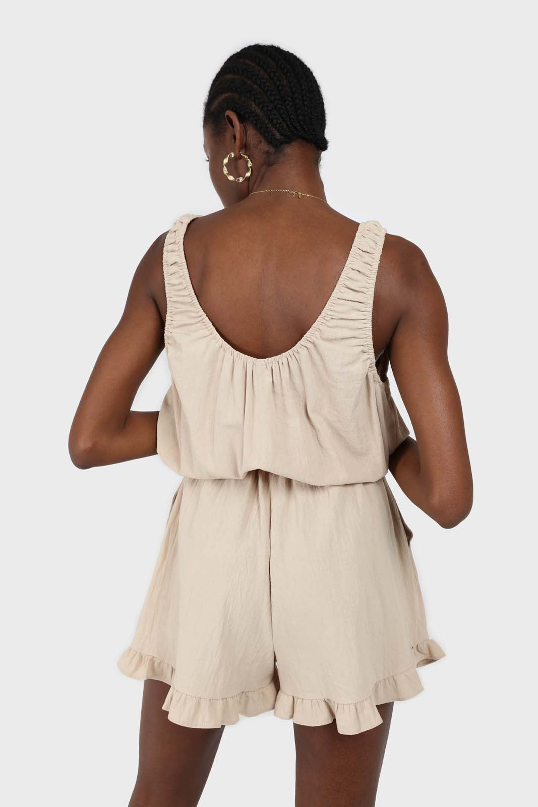 Beige ruffle hem sleeveless romper