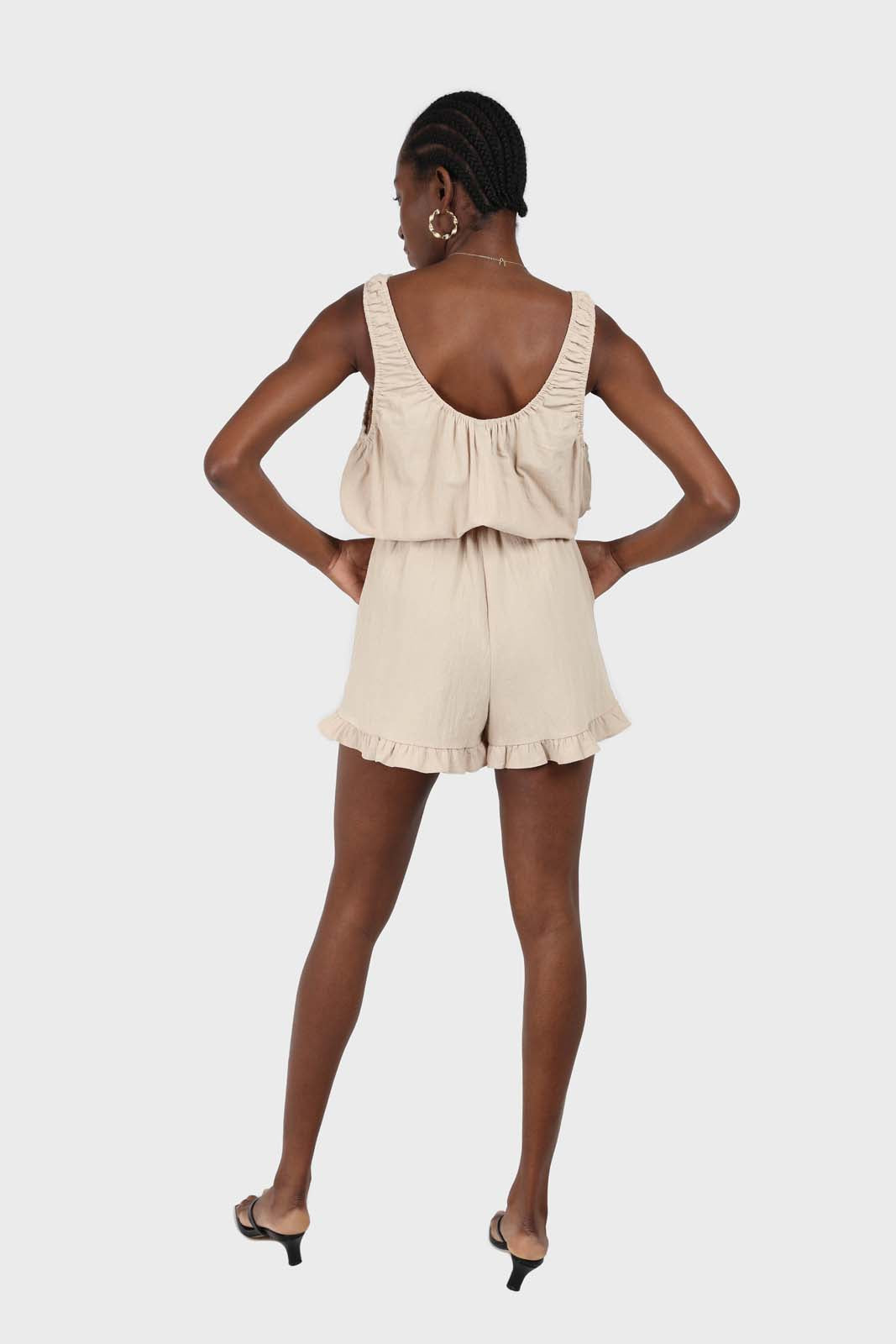 Beige ruffle hem sleeveless romper