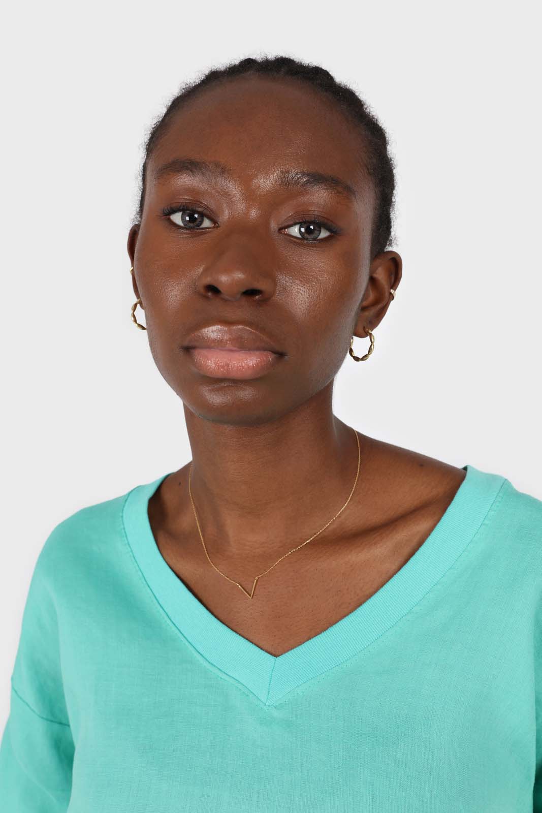 Green V-neck linen long sleeved top