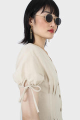 Beige V-neck tie sleeved linen romper