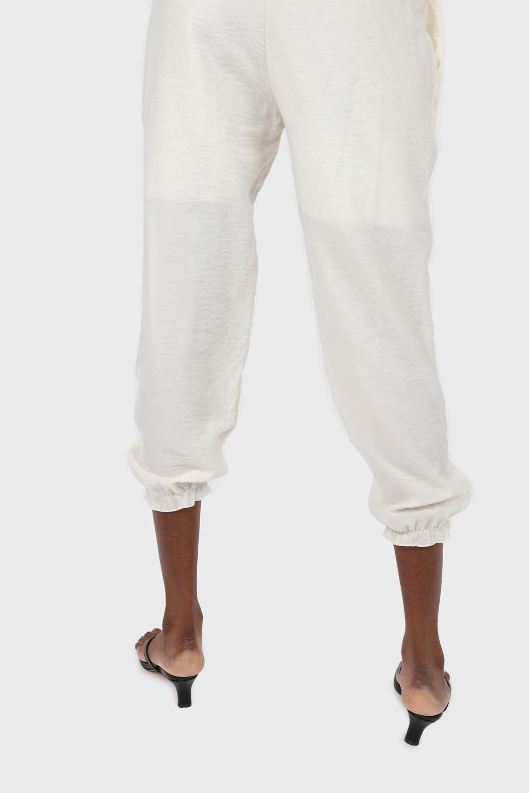 Ivory ruched hem loose fit silky trousers