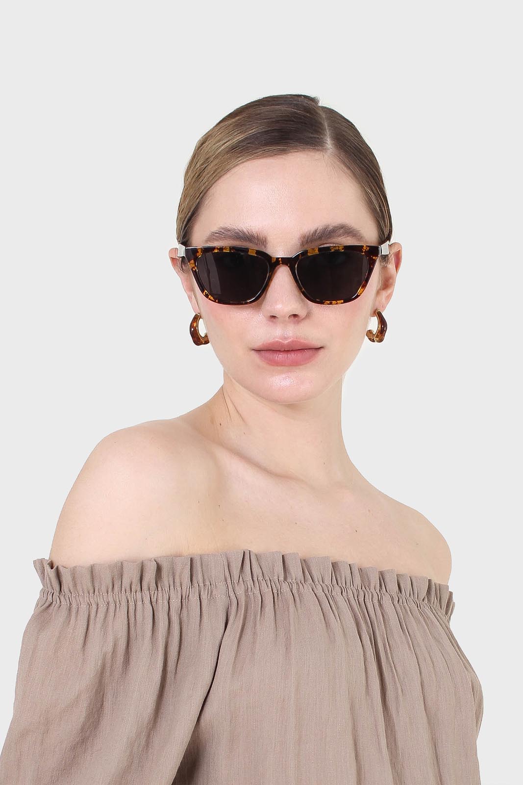 Brown off shoulder tie waist jumpsuit