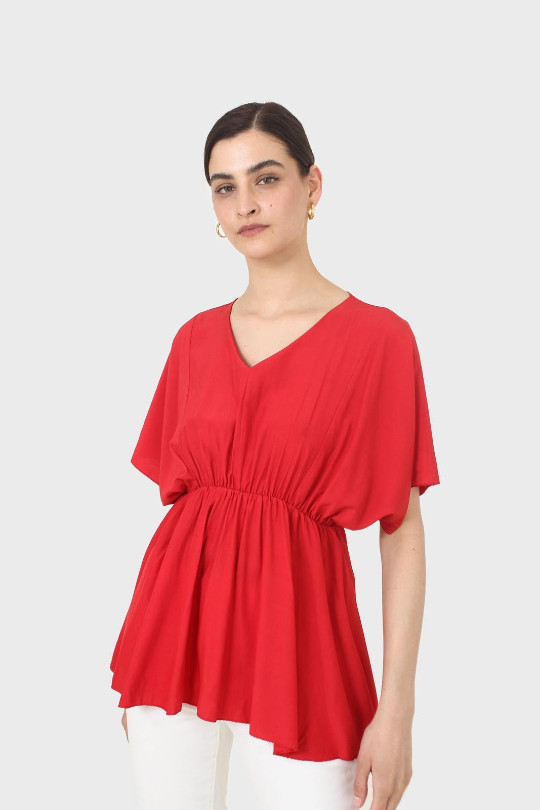 Bright red V-neck wrinkled blouse