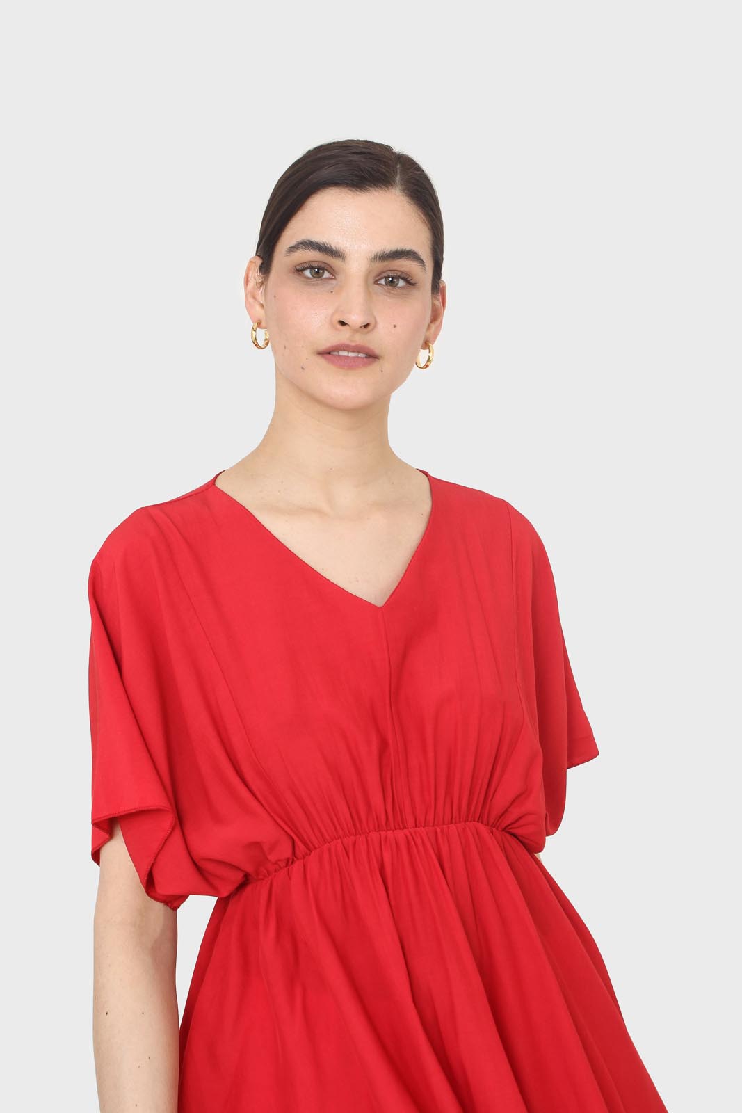 Bright red V-neck wrinkled blouse