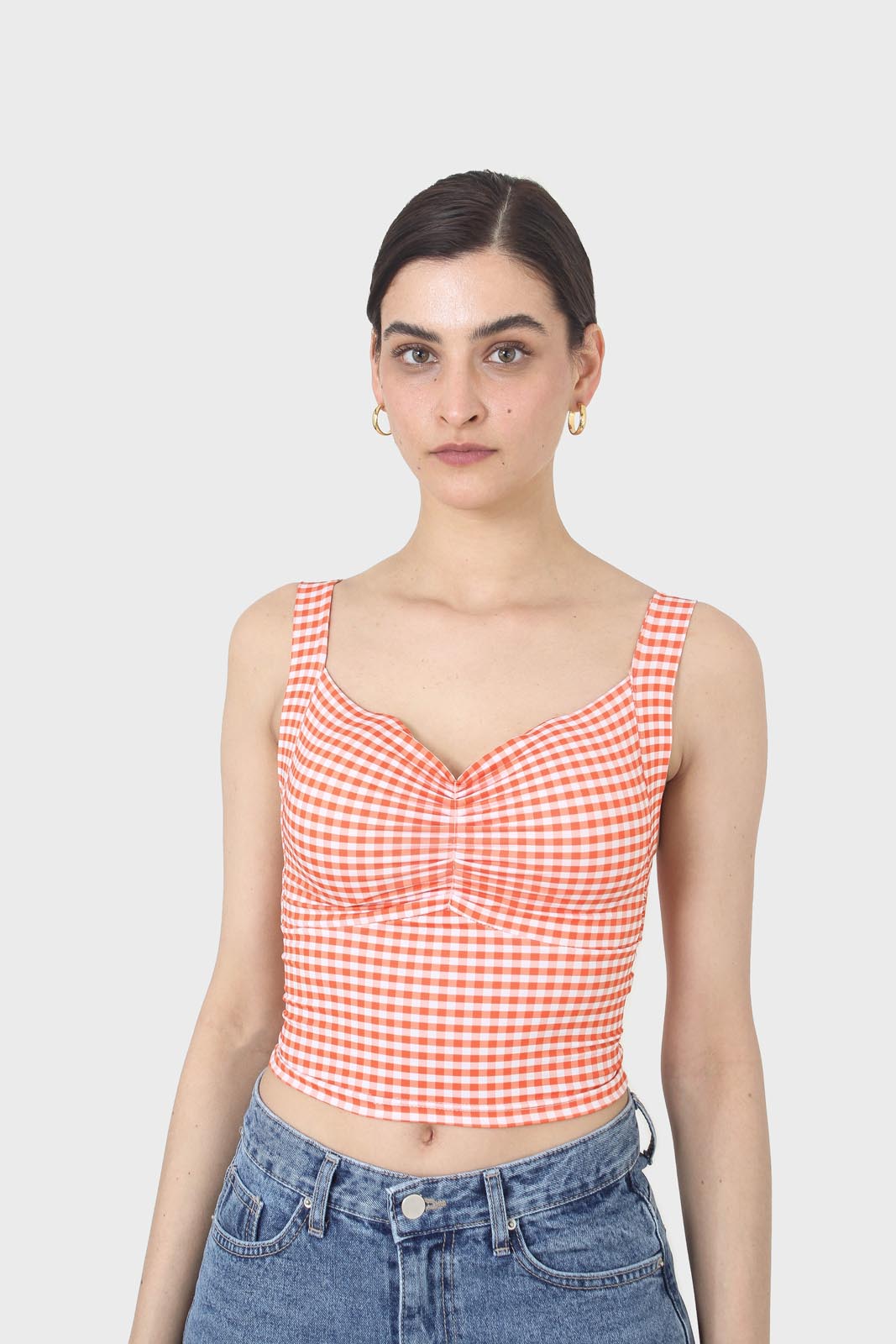 Orange and white gingham cropped tank