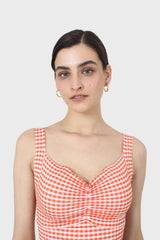 Orange and white gingham cropped tank